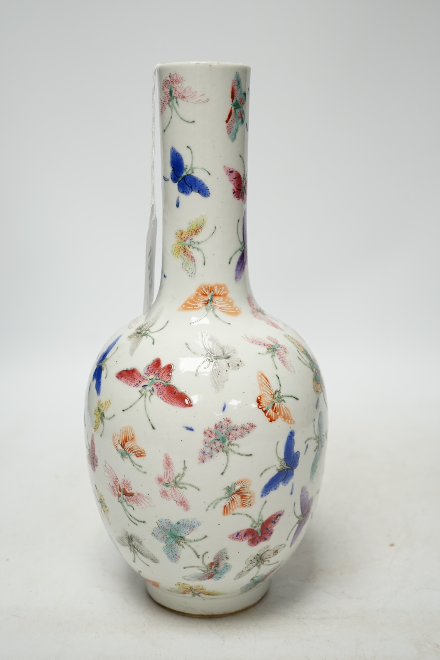 A Chinese famille rose ‘butterflies’ vase, 29cm high. Condition - good, light scratches to footrim, otherwise good. Guangxu marks